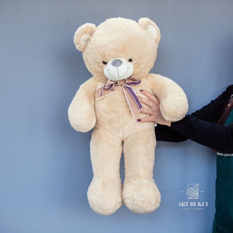 Медведь меховой с бантом бежевый 70 см