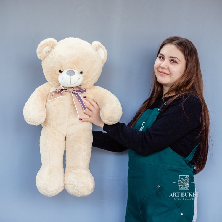 Медведь меховой с бантом бежевый 70 см