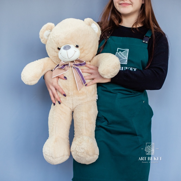 Медведь меховой с бантом бежевый 70 см