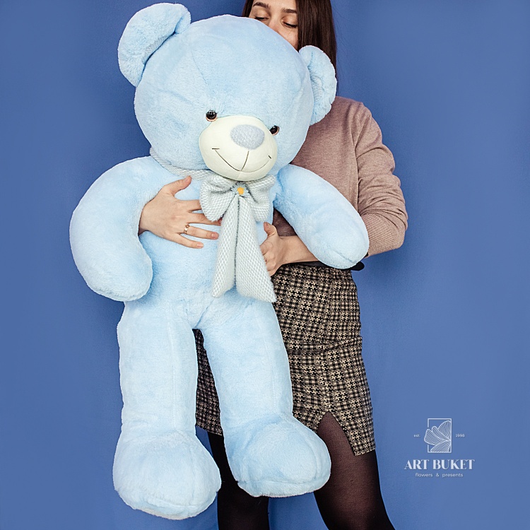 Медведь с ромашкой на бантике 110 см, голубой