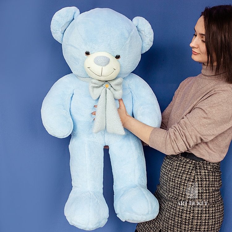 Медведь с ромашкой на бантике 110 см, голубой