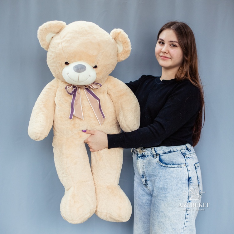 Медведь меховой с бантом бежевый 95 см