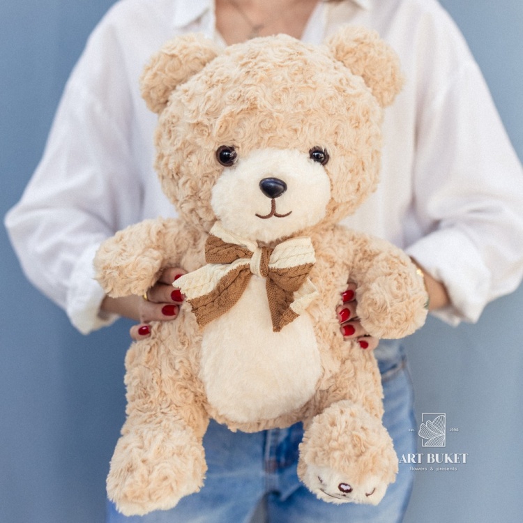 Медведь с бантом кучерявый 40 см бежевый