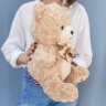 Медведь с бантом кучерявый 40 см бежевый