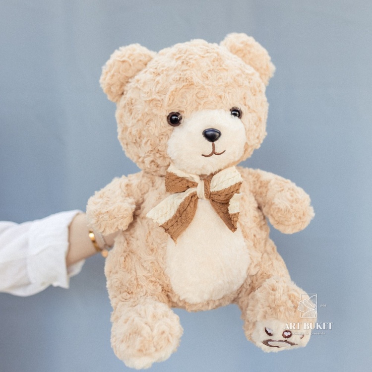 Медведь с бантом кучерявый 40 см бежевый
